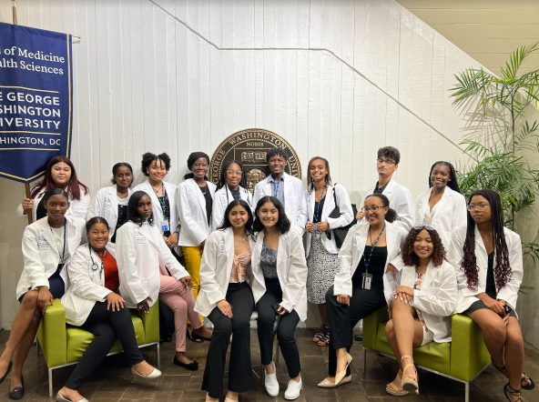 DC HAPP 2022 DC HAPP 2022 cohort group picture in white coats